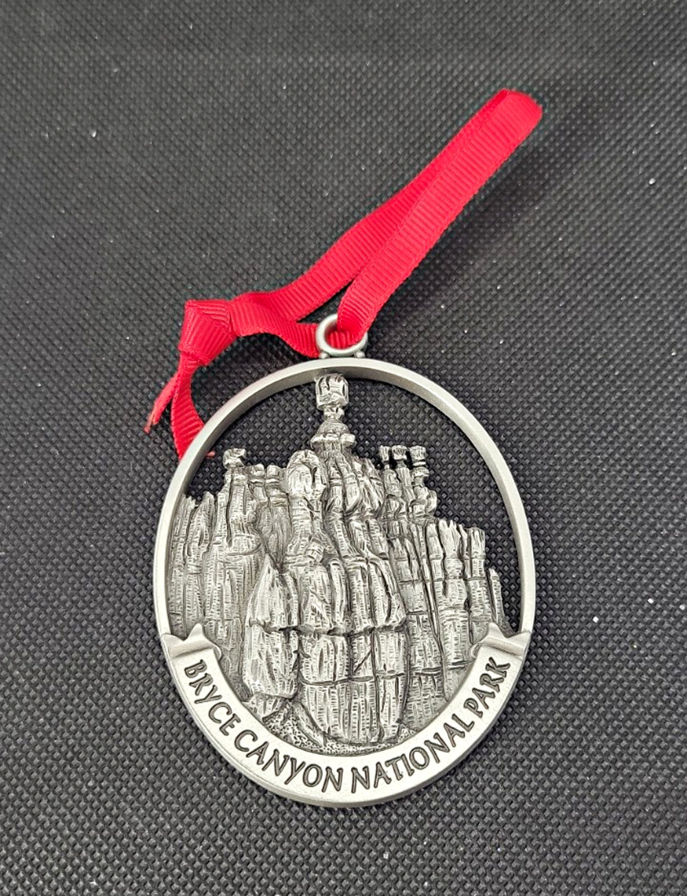 Grand Canyon National Park Pewter Tone Ornament Medallion w/ Red Ribbon